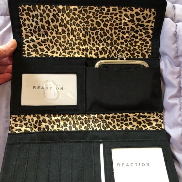 Kenneth Cole Reaction Handbags - Black wallet with animal print